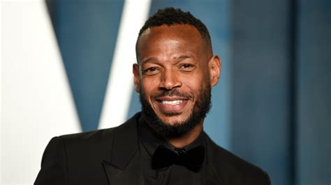 Marlon Wayans says he is being unfairly prosecuted after being racially targeted by gate agent